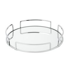 a round glass tray with metal handles