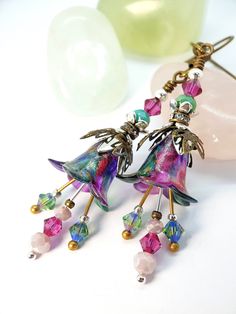 Peony Pink And Green Shimmer Flower Earrings ~ Woodland Pixie Flowers ~ Handmade Dangle Flower Earrings, Boho, Hippie, Bohemian, Art-Nouveau Vintage Style Floral Earrings, Gift For Her. ~ Woodland Flowers ~ ♡ A beautiful pair of vintage Art-Nouveau Bohemian inspired Lucite floral earrings, made with Swarovski Crystal beads in Bright Rose Pink and Leaf Green, accented by Pale Pink Czech glass beads. The Lucite Bell flowers are painted in hues of Peony Pinks and Emerald Green with a slight golden Whimsical Dangle Flower Earrings, Whimsical Multicolor Flower Charm Earrings, Artistic Pink Flower Jewelry, Artistic Multicolor Flower Earrings, Artistic Flower-shaped Earrings With Ear Wire, Artistic Multicolor Flower Drop Earrings, Whimsical Multicolor Flower-shaped Earrings, Adjustable Multicolor Whimsical Flower Earrings, Artistic Flower Shaped Ear Wire Jewelry