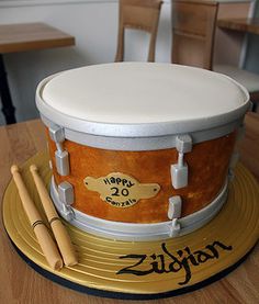 a birthday cake made to look like a drum