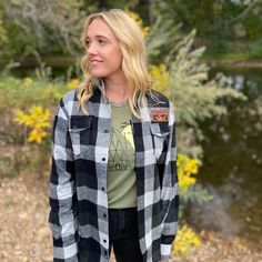 Push your limits with our unisex fit Colorado Patch Flannel! With a bold black and gray buffalo plaid check and a rawhide faux leather patch sporting majestic mountain peaks, it's time to conquer your next adventure in style. Head into the mountains with a new cozy flannel layer. Cotton/Polyester blend w/ laser engraved faux leather patch. Plaid Flannel Shirt For Outdoor, Black Long Sleeve Flannel Shirt For Outdoor, Black Casual Adventure Outerwear, Black Casual Outerwear For Adventure, Casual Black Outerwear For Adventure, Push Your Limits, Old Town Square, Cozy Flannel, Fort Collins