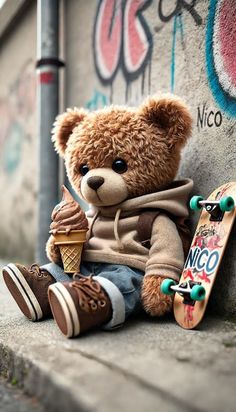 a teddy bear sitting on the ground with a skateboard