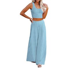 Elevate your fashion game with our Crop Top Long Sleeve Palazzo Pants Set. This stylish ensemble combines comfort and chic, making it a versatile addition to your wardrobe. Whether you're dressing up for a special occasion or looking for a stylish yet comfortable outfit for a casual day out, this set has you covered. The long sleeves provide added versatility, making it suitable for different seasons and settings. Specification: Unshrinkable, wrinkle-resistant fabric, always maintains its shape Chic Two-piece Solid Pants, Blue Solid Color Summer Sets, Spring Two-piece Wide-leg Pants, Non-stretch Two-piece Wide Leg Pants, Wide Leg Non-stretch Pants, Chic Solid Color Wide Leg Sets, Chic Wide Leg Solid Color Sets, Chic Solid Color Wide-leg Pants Sets, Solid Color Wide Leg Sets For Day Out