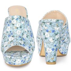 Looking for the perfect pair of summer sandals that will keep you both stylish and comfortable? Look no further than these must-have platform heel slides! Featuring an open-toe design, chunky block heels, and a beautiful floral cut-out design, these slip-on shoes are perfect for any summer activity. They are also lightly padded for added comfort, ensuring that your feet stay happy all day long. These classic shoes are versatile and can be worn with anything from jeans to dresses, making them a s Spring Chunky Platform Slip-on Sandals, Spring Slip-on Chunky Platform Sandals, Spring Chunky Platform Slip-on Slides, Chunky Platform Slip-on Slides For Spring, Chunky Platform Slides For Spring, Open Toe Summer Clogs For Spring, Open Toe Spring Clogs For Summer, Spring Summer Open Toe Clogs, Casual Blue Platform Slippers For Summer