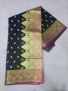 Hand Woven Banarsi Satin Silk Heavy Zari Pallu Bridal Silk Saree With Blouse OFFER- EXTRA 20$ OFF ON PURCHASE OF TWO PRODUCTS. A beautiful, delightful, and absolutely luxurious Banarasi dream! For Instance, The Saree Has where each thread of the Butiy Is knitted by hands. Additionally, It comes In the purest banarasi silk with the pure banarasi silk blouse piece. above all, with vows to sustainable fashion, this silk handloom product from Banaras is a masterpiece involving of brilliance & sheer endeavor of our creative artisans. Tassels vary from the image. Blouse worn by model is for styling purpose only. FABRIC - Banarasi Satin Silk BLOUSE PIECE - Yes TECHNIQUE - This Splendid Masterpiece is made of the finest Fekwa technique of Banaras. WEAVE - Handwoven SILK - 100% Authentic Banarasi S Brocade Saree For Ceremonial Use During Diwali, Black Banarasi Silk Traditional Wear For Ceremonial Occasions, Brocade Traditional Wear With Zari Weaving For Puja, Brocade Saree With Pallu For Puja, Raw Silk Traditional Wear With Meenakari For Puja, Puja Brocade Saree With Pallu, Ceremonial Paithani Silk Saree For Festivals, Banarasi Silk Choli With Traditional Patterns For Puja, Brocade Choli With Zari Weaving For Puja