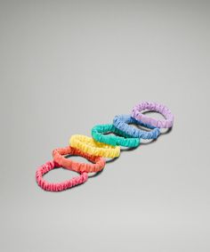 Reduce hair breakage and keep ponytails firmly in control with these skinny scrunchies. Designed for Run.