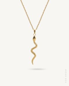 Metal: Stainless Steel Finishing: 18K Yellow Gold PVD Coating Weight: 3.5g Dimensions: Thickness: 1.7mm, Length: Adjustable from 16" to 18" ﻿Pendant: 40mm x 9mm SKU: MBSNK011009 Necklace White Background, Metal Snake Shape Necklace, Elegant 14k Gold Snake-shaped Necklaces, Handmade Gold Snake-shaped Necklace, Gold Snake Necklace, Unique Metal Snake-shaped Necklace, Gold Snake-shaped Metal Necklace, Phone Items, Pvd Coating