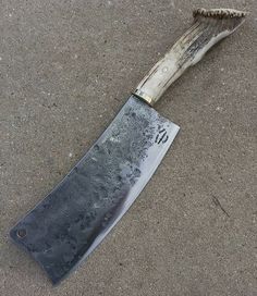 a knife that is laying on the ground