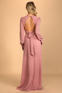 Lulus Exclusive! The Lulus Talk About Divine Blush Long Sleeve Backless Maxi Dress is a dreamy combination of classy and sexy! Lightweight woven chiffon shapes this gorgeous dress that has a plunging V-neckline and sheer long sleeves with button cuffs. A princess-seamed bodice tops a set-in waist and a cascading maxi skirt. The alluring open-back design is accented with a tying sash and button closure at the neck. Hidden back zipper/clasp. Fit: This garment fits true to size. Length: Floor lengt Chic Fitted Chiffon Dress For Wedding Guest, Elegant Pink Chiffon Dress For Wedding Guest, Fitted Backless Chiffon Maxi Dress, Fitted Feminine Maxi Length Chiffon Dress, Fitted Feminine Maxi-length Chiffon Dress, Chic Fitted Backless Dress For Wedding Guest, Feminine Fitted Maxi Chiffon Dress, Feminine Fitted Maxi Length Chiffon Dress, Fitted Chiffon Backless Dress