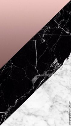 a black and white marble counter top next to a pink wall