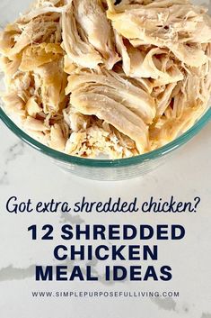 shredded chicken in a glass bowl with the words got extra shredded chicken?