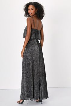 The way you sparkle in the Lulus Elegant Shimmer Shiny Black and Silver Plisse Maxi Dress will grab everyone's attention! Stretchy plisse fabric, with silver lurex threading throughout, shapes this stunning dress that falls from adjustable spaghetti straps into a straight neckline with a flouncy overlay atop a fitted bodice. High, fitted waist sits atop a flowing A-line skirt that ends at an elegant maxi hem. Hidden back zipper/clasp. Fit: This garment fits true to size. Length: Floor length. Si Glamorous Pleated Maxi Dress For Night Out, Glamorous Metallic Maxi Dress, Evening Shimmer Dresses, Glamorous Evening Maxi Dress With Shimmer, Shimmer Maxi Dress For Gala, Shimmer Gala Maxi Dress, Metallic Shimmer Maxi Dress, Silver Glitter Dress For Gala, Glamorous Pleated Evening Dress For Night Out