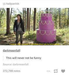 a woman standing next to a pink cake in the middle of a forest with text that reads, dark moonfall this will never not be funny