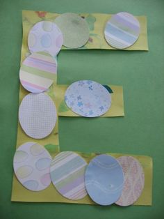 the letter e is made out of paper plates