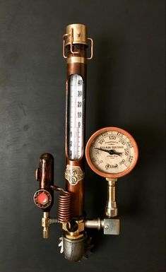 an old fashioned water heater and thermometer