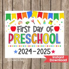 a sign that says first day of preschool, with colorful flags and confetti