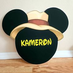 a mickey mouse hat with the name karmeron on it's face and ears