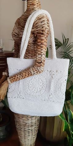 Stylish, roomy, high quality white raffia bag is an ultimate summer bag. This large crochet tote - something a woman would want to be seen out with.  Can be used like oversized beach bag, market shopping bag, daily and holiday bag. It can keep a lot of little things that no woman can do without.  Great handmade gift for any occasion and for women any age. more crochet bag here https://etsy.me/3mXZ93a Size: 16`` length x 14`` height (40 x 35 cm), length mentioned without handles Lining: 100% cotton Crochet tote bag of paper yarn is smooth, strong, soft, breathable, hypo-allergenic, does not gather dust or dirt- lightweight, does not wrinkle, easy to wash Paper raffia yarn is tolerate well humid conditions. Due to the tight crochet, it does not ignite easily. CARE: hand washable in cold wate Cheap White Beach Bag With Double Handle, Cheap Crochet Beach Bag For Beach Season, Bags To Go With Knitted White Dress, Cheap White Shoulder Bag For The Beach, Cheap White Bucket Bag For The Beach, Cheap White Woven Beach Bag, Cheap Trendy Cream Beach Bag, Cheap Handmade White Beach Bag, Cheap White Casual Beach Bag