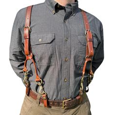 Upgrade your workwear or wedding attire with our Handmade Whiskey Leather Suspenders, expertly crafted from 100% Wisconsin premium leather. Designed for durability and style, these suspenders feature solid brass hardware and adjustable snap loops that provide a secure fit. Whether you're looking for rugged work suspenders or elegant accessories for a special occasion, our heavy-duty leather suspenders are built to last. Inspired by classic 1900s designs, they offer both functionality and timeles Fitted Leather Belts And Suspenders For Work, Leather Suspenders Wedding, Yakuza Game, Wedding Suspenders, Suspenders Wedding, Work Belt, Leather Suspenders, Leather Wedding, Antique Brass Hardware