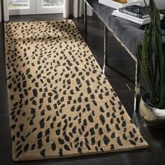 a leopard print rug in a living room