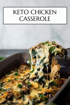 a cheesy casserole with spinach and mushrooms is being lifted from the casserole dish