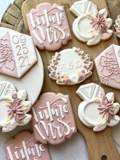 some decorated cookies are sitting on a table