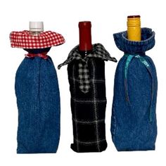 three wine bottles in denim bags with ties on them