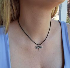 "Measures 23 x 23 mm. Sterling Silver on 18-20″\" adjustable black cord and gift box." Dragonfly Pendant, X 23, Pendant Necklaces, Cross Necklace, Arrow Necklace, Piercings, Gift Box, Necklaces, Pendant Necklace