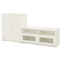 a white entertainment center with two doors and shelves