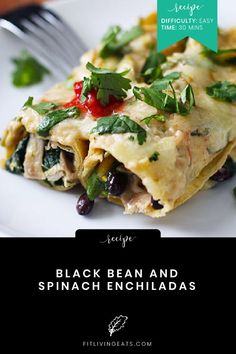 black bean and spinach enchiladas on a white plate with a fork