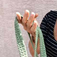 "This pretty crochet tote in sage green color is inspired by happy nature colors. Lovely bohemian style accessory and everyday tote to carry light groceries in or take it to a beach! It is made from Earth friendly cotton yarn (cotton is a renewable resource) and it is easy to care for. Just toss it in the washing machine and wash in cold water on hand wash cycle. To dry, lay it flat. The tote's approximate measurements when it is laying flat: about 22 1/2\" tall from the top of the handle to the Bohemian Crochet Bag For Spring, Bohemian Green Shoulder Bag For Everyday, Green Summer Crochet Bag For Everyday Use, Bohemian Green Crochet Bags, Green Bohemian Shoulder Bag For Spring, Summer Style Green Crochet Bag For Everyday Use, Eco-friendly Green Crochet Bag, Green Bohemian Crochet Bag For Everyday, Green Bohemian Crochet Bag For Market