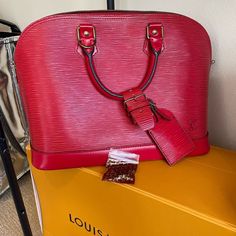 Louis Vuitton Alma Red Pi Euc Date Code Is Ar0966 Includes: *Alma Bag *Lv Lock & Key #328 In Lv Baggie. *Lv Luggage Tag And Poignet (Resales For Over $150) And *Lv Box-In Used Condition This Bag Is Beautiful Inside And Out. Great Gifting Opportunity For The Holidays And The Color Is Everything! Bag Is 100% Authentic And Will Go To Pm For Free Authentication. The Other Red Pi Items In First Photo Are Also Available. Comment With Questions. Does Not Include Dust Bag. Please Ask All Questions Before Purchasing. All Sales Are Final. Lv Luggage, Beautiful Inside And Out, Luggage Tag, Luggage Tags, First Photo, Louis Vuitton Bag, Dust Bag, Bag Lady, Louis Vuitton