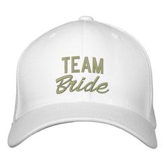 a white baseball cap with the word team bride embroidered on it