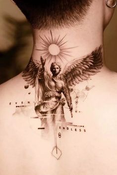 Dive into the world of celestial tattoos. Explore at Glaminati.com for heavenly ideas. #CelestialInk #TattooLove #Glaminati Angel Tattoo Ideas, Celestial Tattoos, Angel Warrior Tattoo, Angel Back Tattoo, Saint Tattoo, Cupid Tattoo