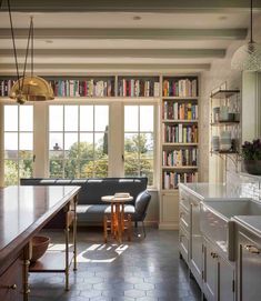 the kitchen is clean and ready to be used as a living room or dining area