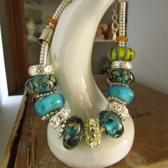 Fun Multicolor Glass Beaded Bracelet With Stunning Beads!!! Blues, Greens, Silver, Gold, Rhinestones, Silver Spacers, Lobster Clasp, 7" End To End. New Without Tags. We Are Offering Many Bracelets In This Same Style All With Completely Unique Beading On Each One. Get A 15% Discount On Bundle Of 2 Or More Special Discount Pricing On Most Items We Have An Eclectic Mix Of Vintage (And Some New) Items You Will Love, Check Out My Whole Closet And Follow Me! Thank You So Much Glass Beaded Bracelet, Glass Beaded Bracelets, Same Style, End To End, Womens Jewelry Bracelets, Beaded Bracelet, Lobster Clasp, New Items, Silver Gold