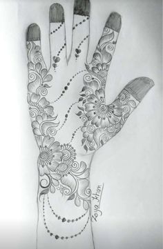 a drawing of a hand with flowers and beads on the palm, which is drawn in pencil