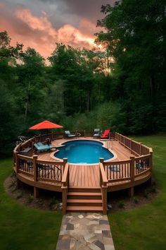 an above ground pool surrounded by wooden decking