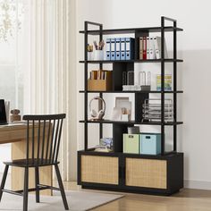 a black bookcase with baskets on it in front of a desk