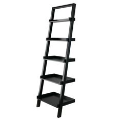 a black shelf with three shelves on each side and one is leaning against the wall