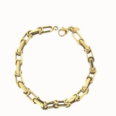 Elevate his style with the timeless elegance of our 18k Solid Yellow Gold Link Bracelet. This exquisite 8-inch piece, weighing 10 grams, is expertly crafted in Italy and captures the essence of sophistication. A perfect gift for men, its hypoallergenic 18k gold construction ensures both quality and comfort. Delivered in an Amalia blue gift box, this bracelet is not just an accessory, but a statement of refined taste Classic Link Bracelet With Jubilee Detail, Classic Link Jubilee Bracelet, Classic Jubilee Link Chain Bracelet, Classic Jubilee Chain Bracelet, Classic Bangle Jewelry With Box Chain, Classic Chain Bracelet With Solid Link Construction, Luxury Stainless Steel Chain Bracelet With Rectangular Links, Luxury Gold-tone Bracelets For Everyday, Classic Jubilee Bracelet With Oval Links