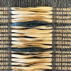 an image of woven material that looks like it is made out of wood and fabric