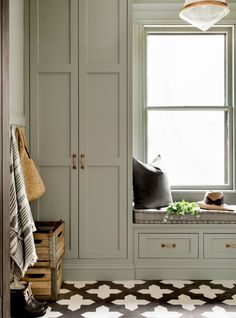 the instagram page shows an image of a room with white cupboards and drawers