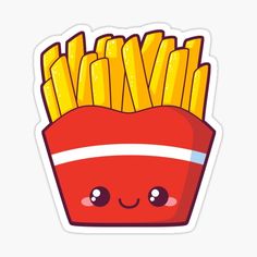 a red box filled with french fries on top of a white table next to a sticker