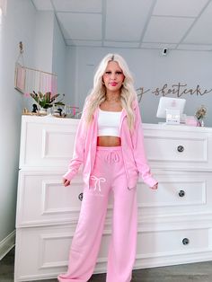 We are so excited to release our newest merch item! The Sassy Bow Sweatpants in Bubblegum pink feature a white bow and the text Sassy Shortcake. These wide leg sweats feature an elastic waistband and pockets for maximum comfort, and feature a soft micro-fleece lining. Rep your favorite brand in these super cute pants!! Wear it as a set! Pair it with the matching bubblegum pink bow zip up. fits: true to size, model wearing a size small content: 100% polyester care: hand wash cold Trendy Pink Leisure Pants, Trendy Pink Pants For Leisure, Pink Sweatpants For Spring Loungewear, Pink Spring Sweatpants For Loungewear, Pink Sweatpants For Lounging, Pink Cotton Sweatpants For Pajama Party, Trendy Pink Sweatpants For Lounging, Sporty Pink Loungewear Pants, Pink Athleisure Pants For Lounging