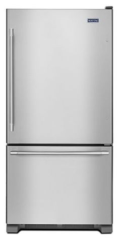 a stainless steel refrigerator freezer sitting on top of a white surface with the door open