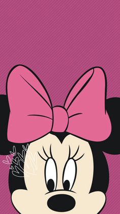 minnie mouse with a pink bow on her head