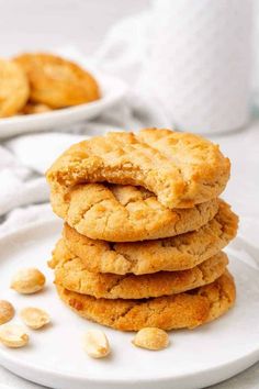 a stack of cookies sitting on top of a white plate