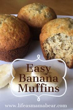 three banana muffins sitting on top of a white plate