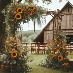 an outdoor ceremony with sunflowers and greenery on the arbor, surrounded by wooden chairs