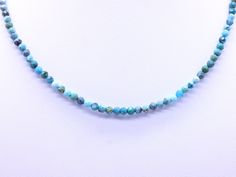 "This classic dainty necklace is made from high quality AAA grade genuine Kingman 3mm natural genuine micro faceted turquoise beads. These small round stones are beautiful shades of brilliant blue and green mix, are micro faceted, reflect the light magically, are perfectly calibrated, and are uniform in size. - Not dyed, treated or color enhanced. 100% natural. - Photos taken outside in natural lighting and in a light box. - No filters or color enhancements are added to the photos. The 3mm turqu Blue Single Strand Turquoise Necklace With Chrysocolla, Hand-strung Blue Turquoise Chrysocolla Necklace, Blue Turquoise Necklace With Gemstone Beads, Hand-strung Chrysocolla Turquoise Necklace, Blue Turquoise Chrysocolla Necklace With Gemstone Beads, Chrysocolla Turquoise Necklace With Gemstone Beads, Blue Turquoise Chrysocolla Necklace Single Strand, Spiritual Blue Turquoise Necklace With Faceted Beads, Boho Choker Necklace